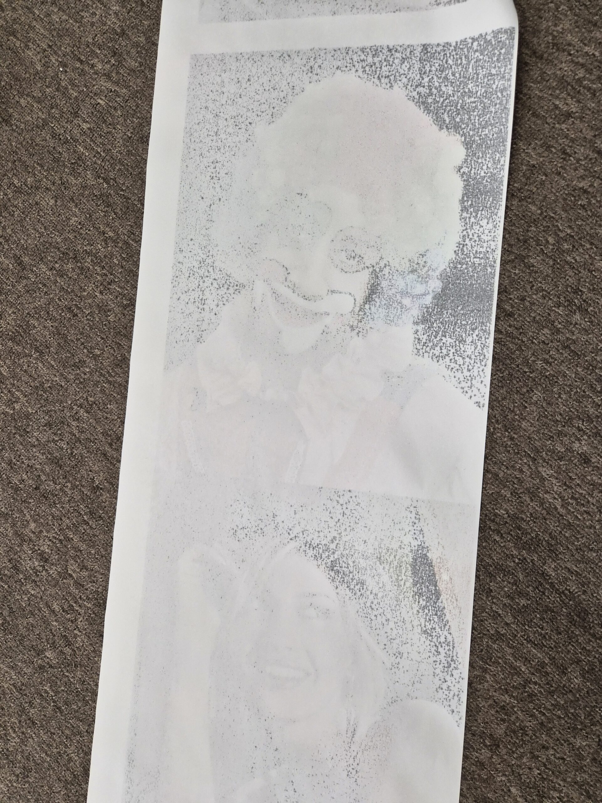 Close-up comparison of sharp printing and ink bleeding on printable canvas during a print-quality test